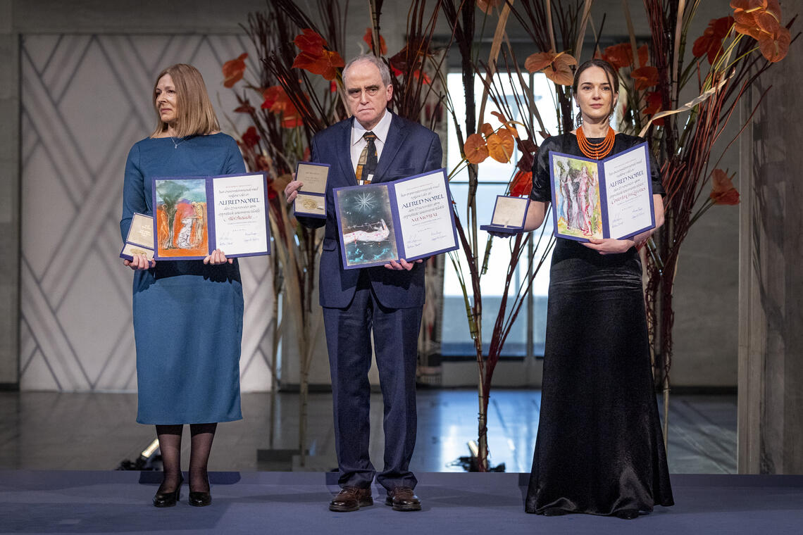 Representatives of the Nobel Peace Prize Laureates for 2022 with the Gold medal and Diplomas.